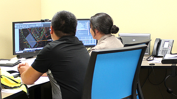 Two at desk working