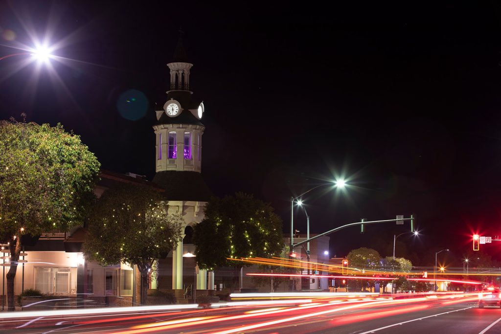 Night time traffic streams through historic downtown Red Bluff, California